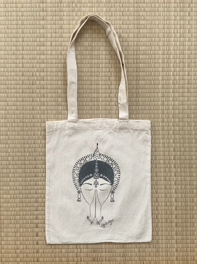 The Gungur tote bag is a 100% cotton bag featuring Gungur signature motif, the Odissi dancer with hands in Anjali mudra. Light, breathable and durable this is a tote bag you can use every day, or keep for special occasions1