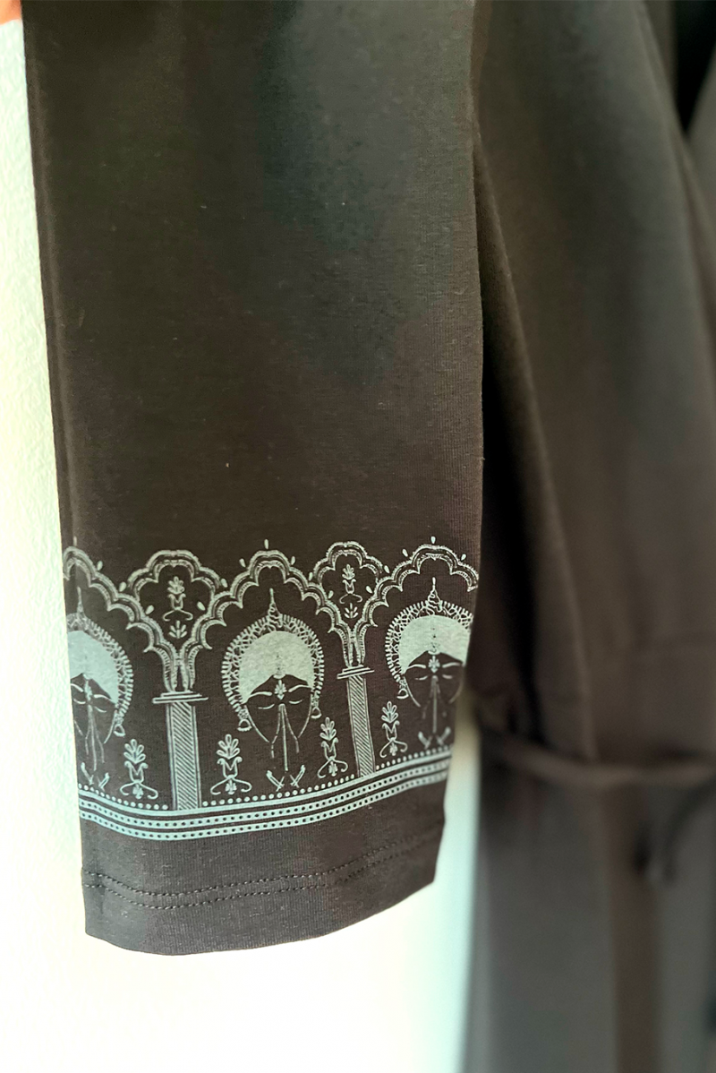 ByGungur Lotus Kurta three quarter length sleeves are decorated with beautiful design inspired by temples in Orissa, India and the Gungur signature motif, a dancer with hands in Anjali mudra.