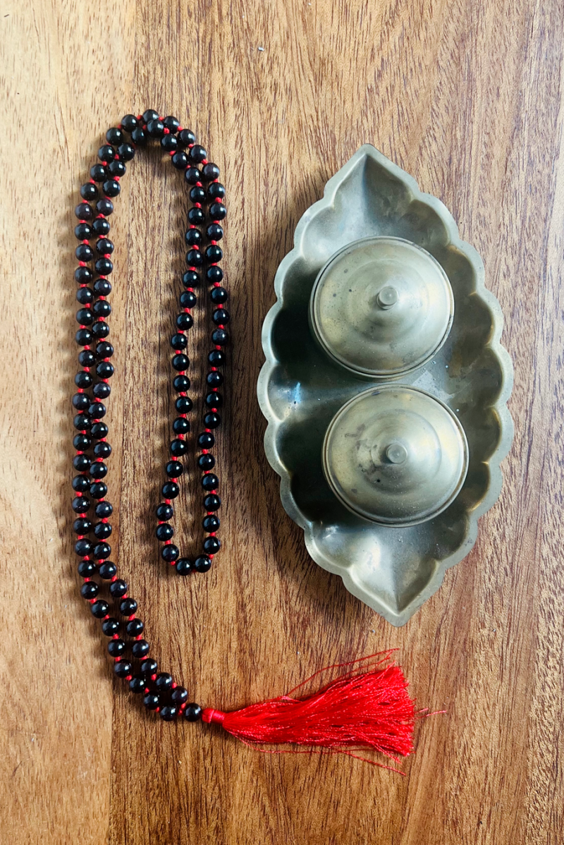 The ByGungur Garnet Mala is made with authentic garnet beads. It has 108 beads plus the guru bead. Each garnet stone is round and highly polished, perfect for counting mantras, for meditation, or to wear as jewelry.